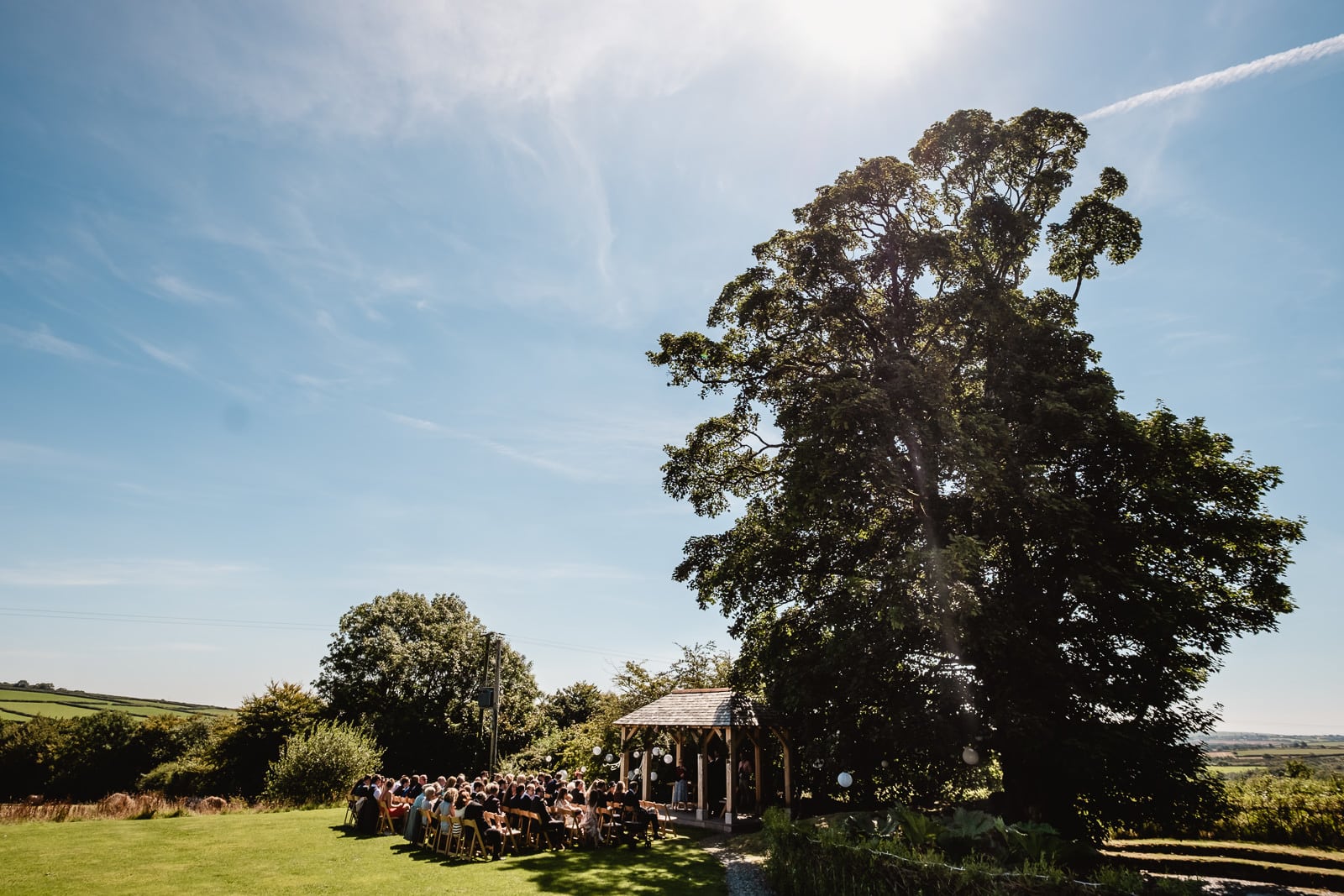 The outside arbour at Trevenna with a ceremony in full swing